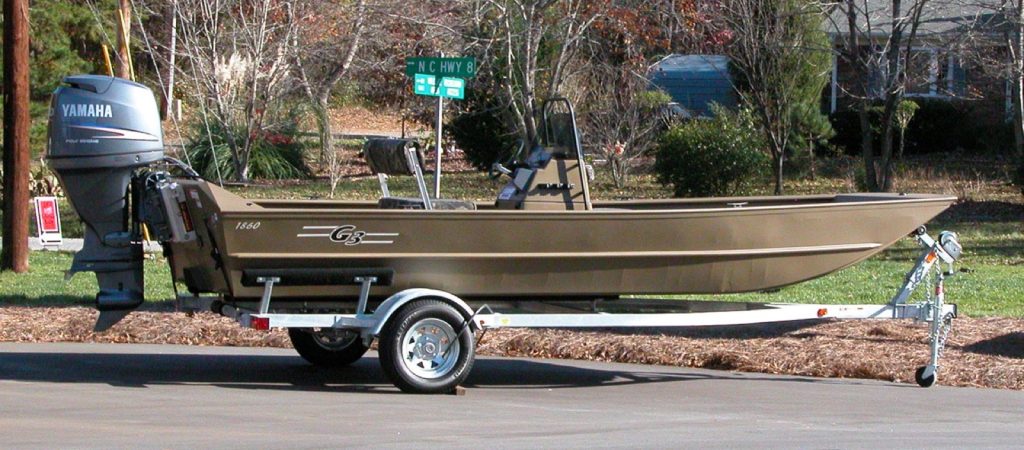Bass boat on freshwater for fishing points and drop-offs